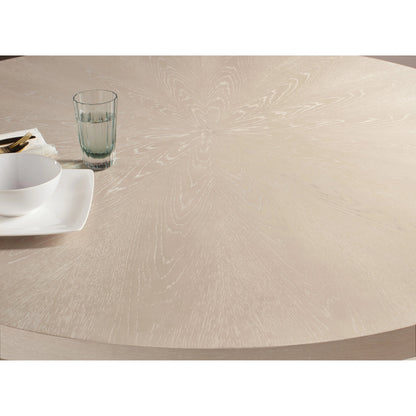 Nouveau Chic Round Pedestal Dining Table by Hooker Furniture in sandstone. Made from oak veneers, resin in a modern style.