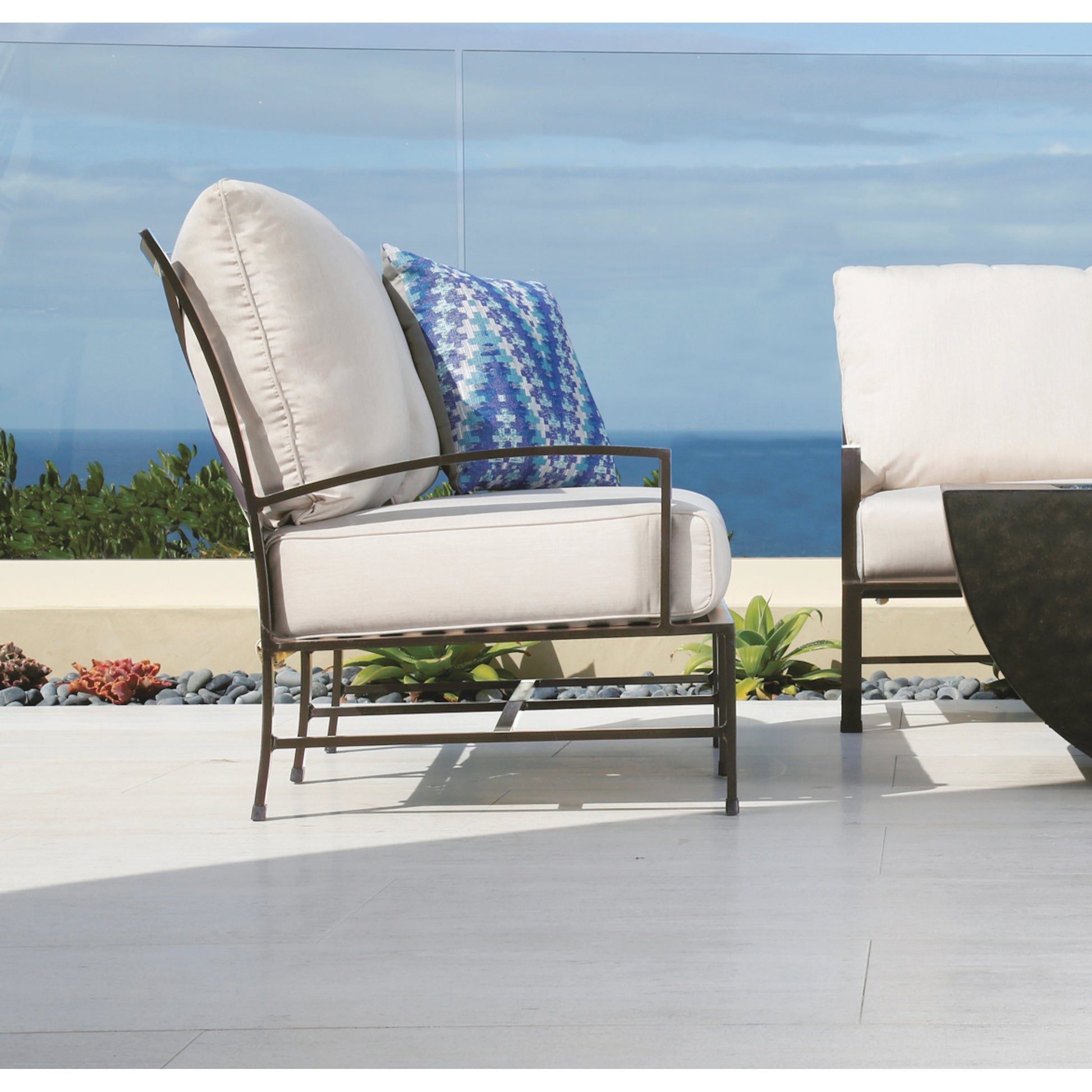 La Jolla Outdoor  Loveseat by Sunset West in browns. Made from aluminum in a modern style.