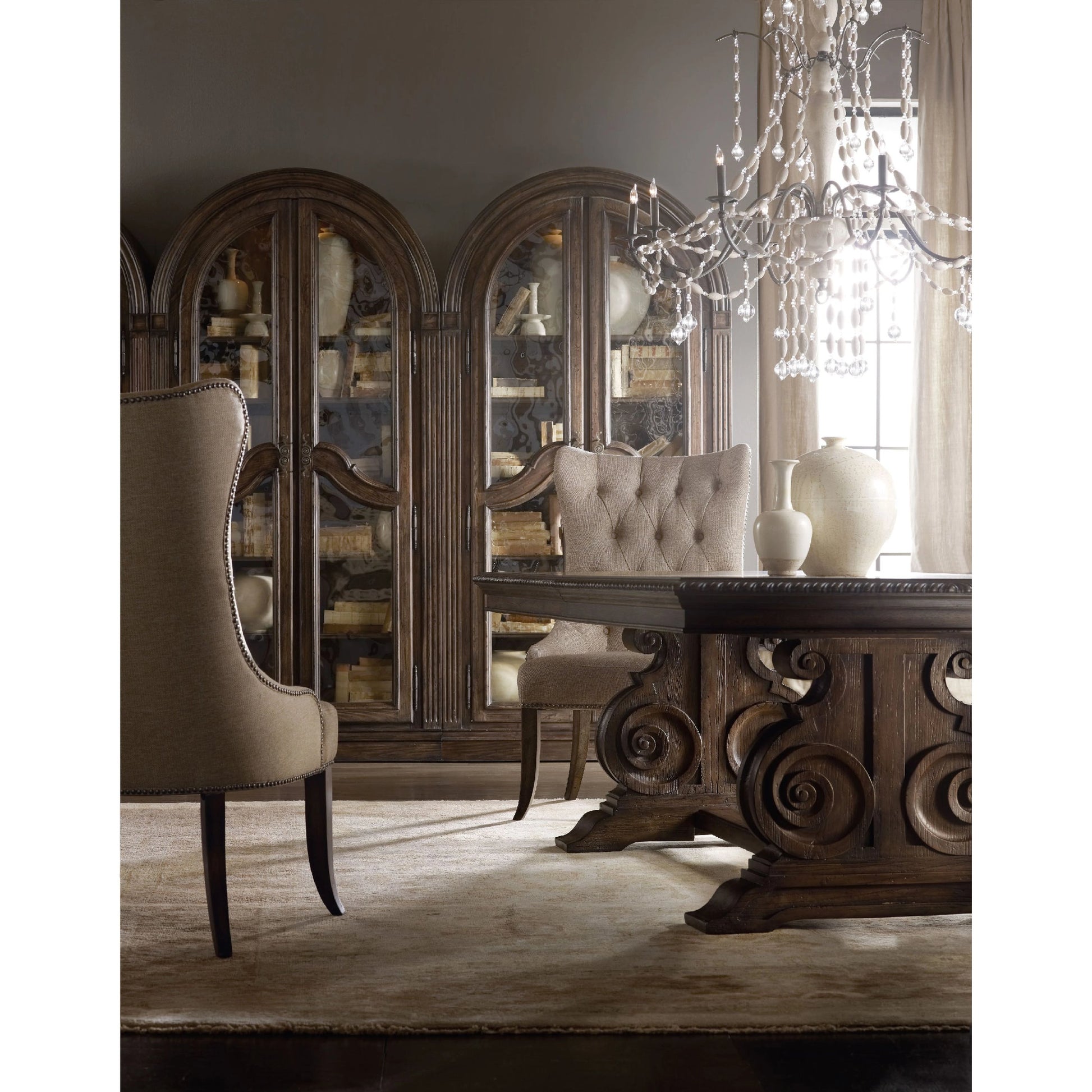 Rhapsody Curio Cabinet by Hooker Furniture in rustic walnut. Made from pecan veneers, metal, seeded glass, resin in a traditional style.