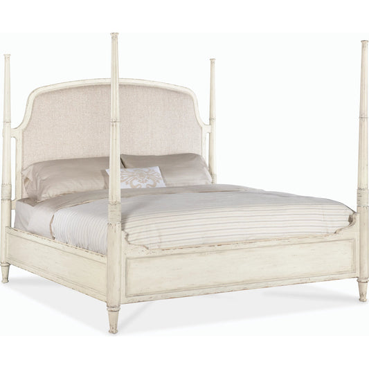 Americana Queen Upholstered Poster Bed by Hooker Furniture in beige. Made from oak veneers and fabric in a modern style.