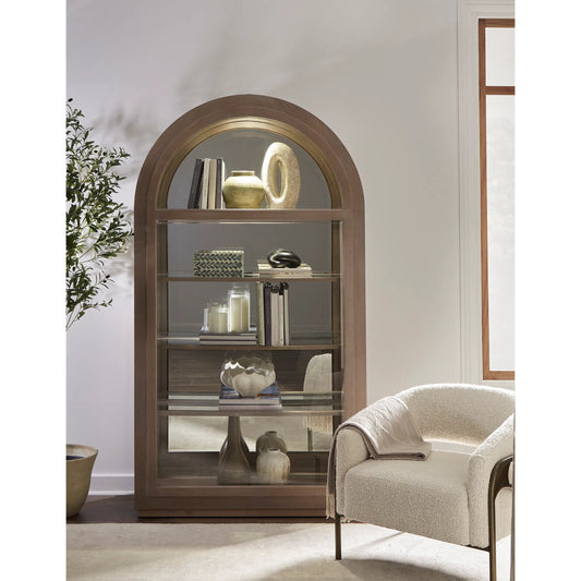 Arch Sliding Door Curio Cabinet by Pulaski Furniture in medium wood. Made from oak veneer in a unique style.