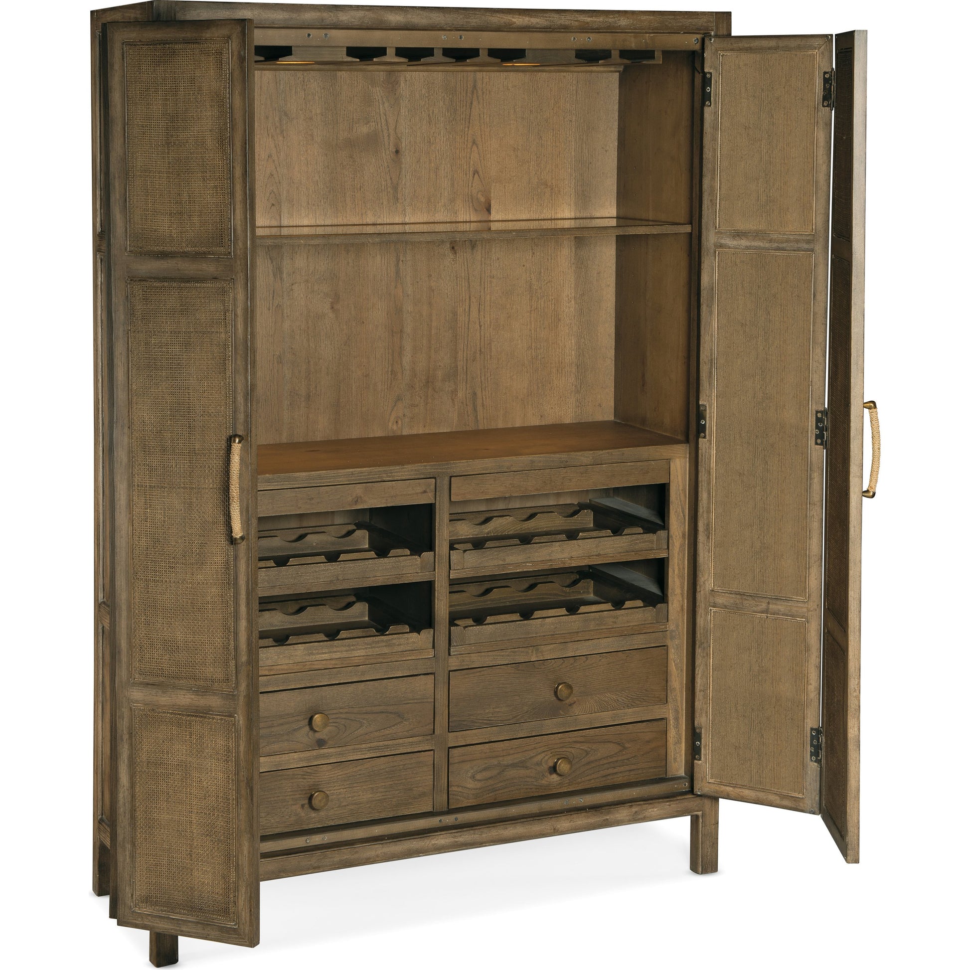 Sundance Bar Cabinet by Hooker Furniture in cliffside. Made from pecan veneers, rattan, glass, puck light, self-closing undermount drawer guides in a transitional style.