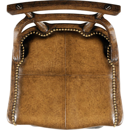 Buckingham Oak Studded Leather Barstool by Jonathan Charles in brown and dark brown tudor oak. Made from oak in a rustic style.