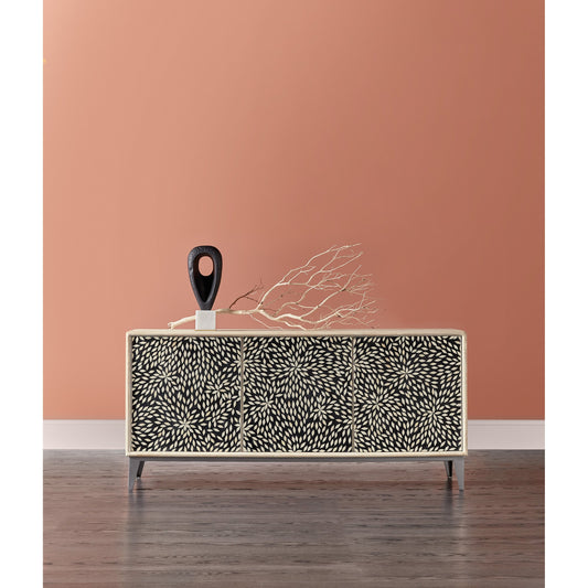 Melange Petrina Three Door Credenza by Hooker Furniture in light wood. Made from mango wood with bone inlay, iron in a transitional style.