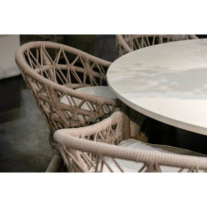 Dana Outdoor Rope Dining Chair in Linen by Sunset West in natural. Made from olefin rope in a coastal style.