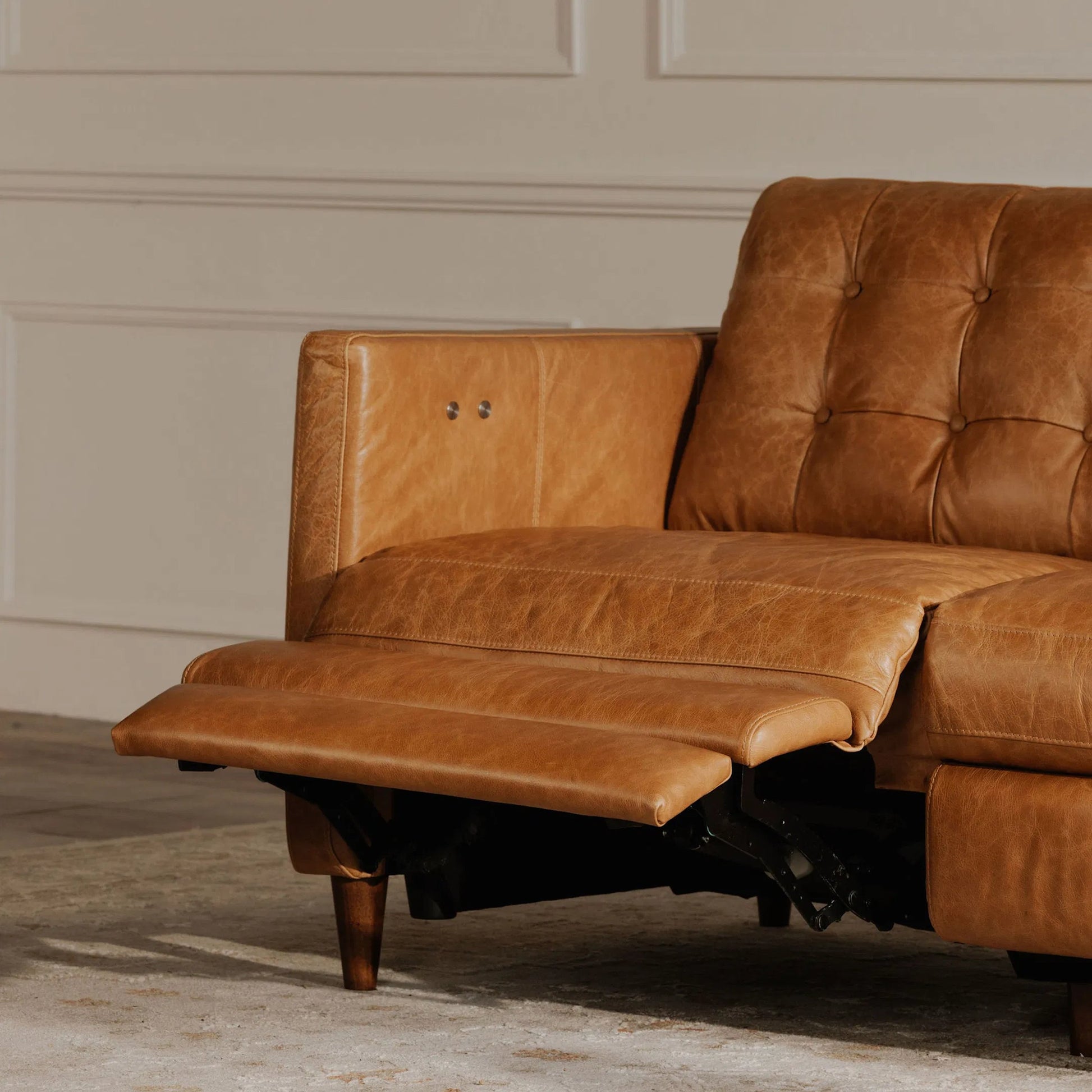 Bridgers Power Recliner Sofa by Moe's Home Collection in tan leather. Made from upholstery: 100% top grain leather, high density foam, feather fill, solid red meranti wood frame, webbing seat, recliner: metal, okin motor in a t