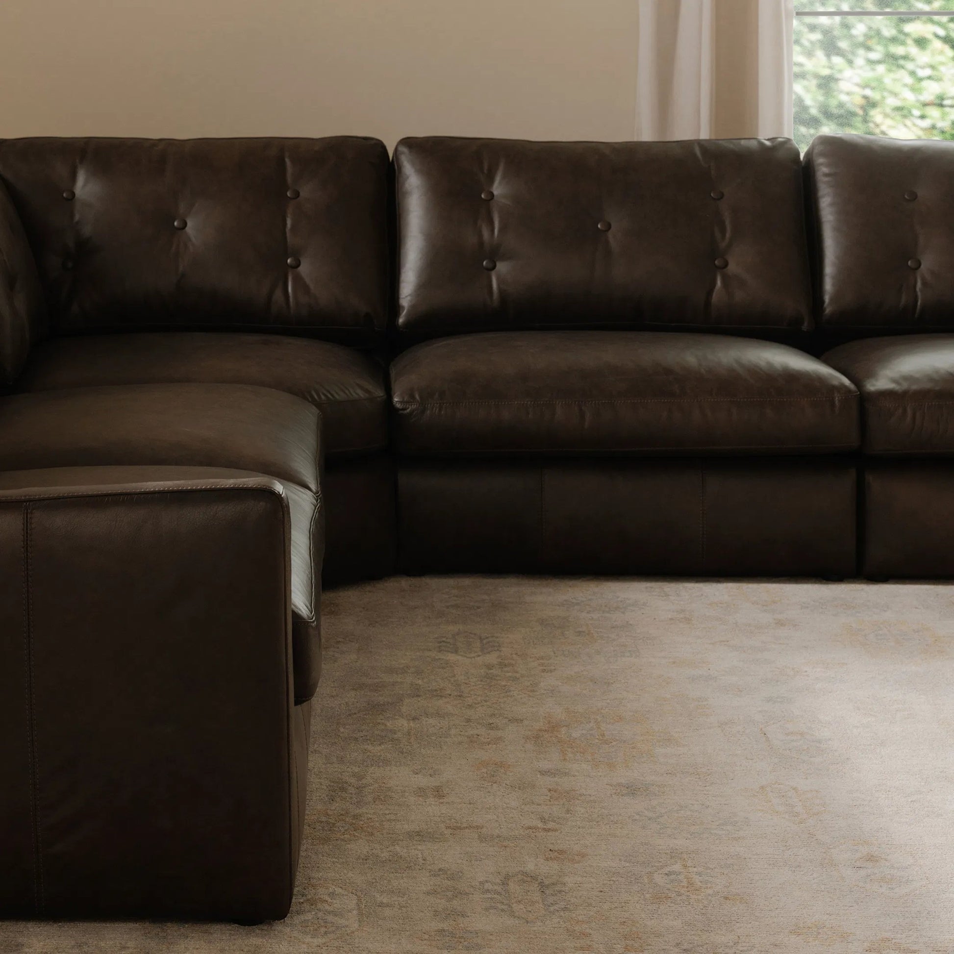 Thurlow Arm Facing Sofa by Moe's Home Collection in espresso. Made from upholstery: 100% top grain leather, high density foam, feather fill, solid red meranti wood frame, webbing seat in a unique style.