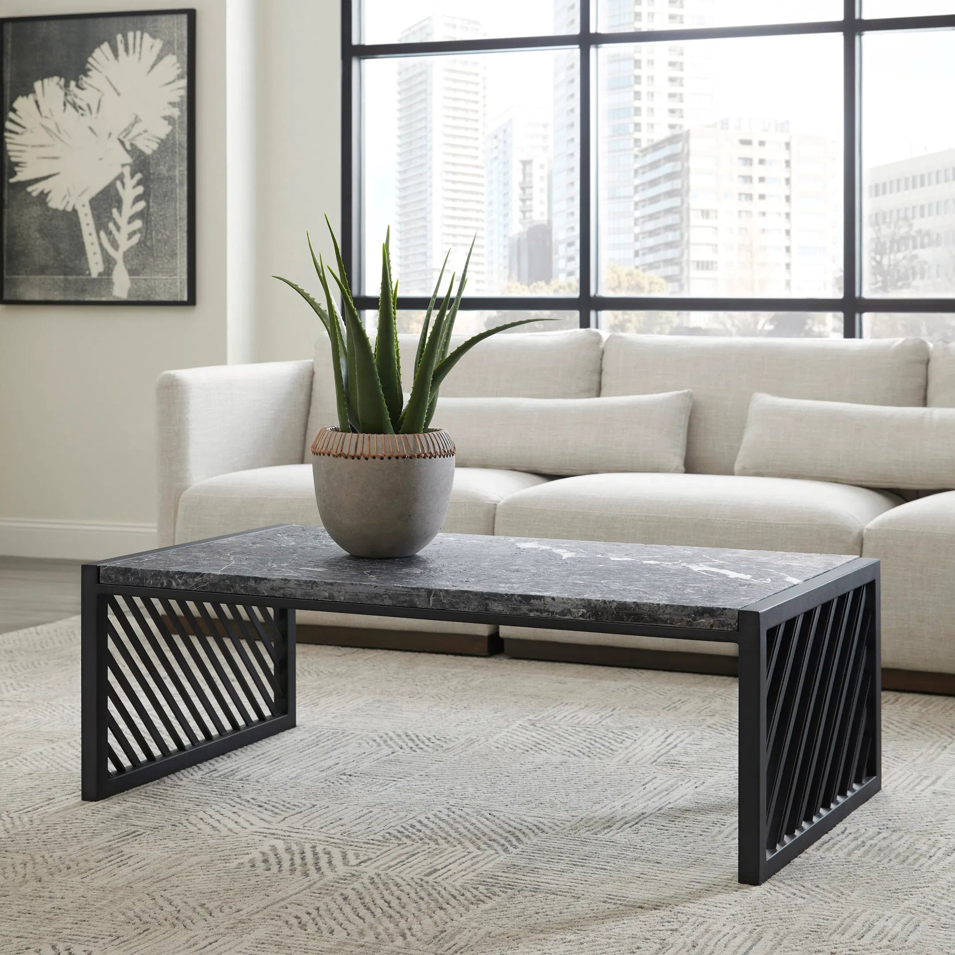 Modern Industrial Stone Top Cocktail Table by Pulaski Furniture in black. Made from stone in a modern style.