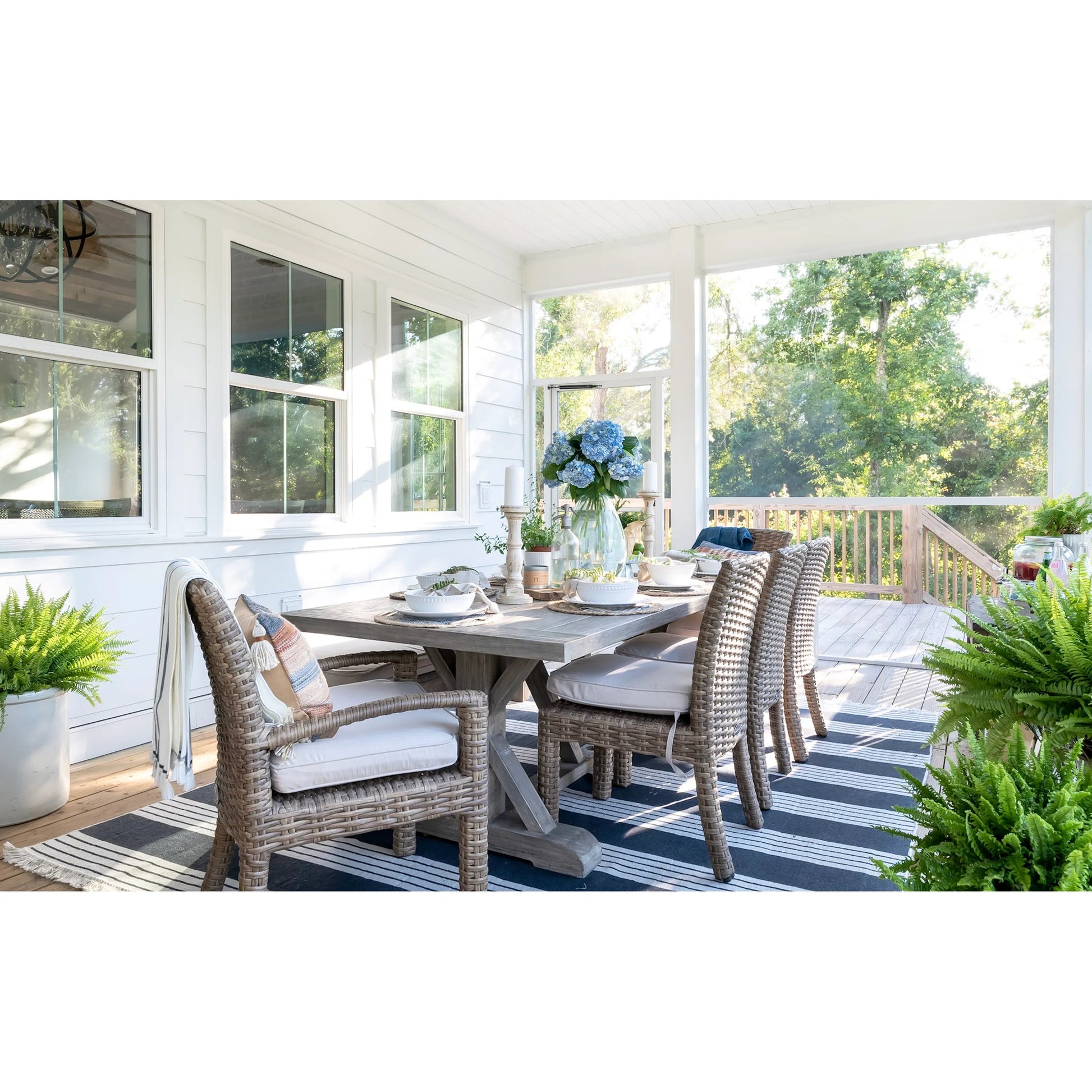 Havana Outdoor Armless Dining Chair by Sunset West in tobacco. Made from resin wicker in a modern style.