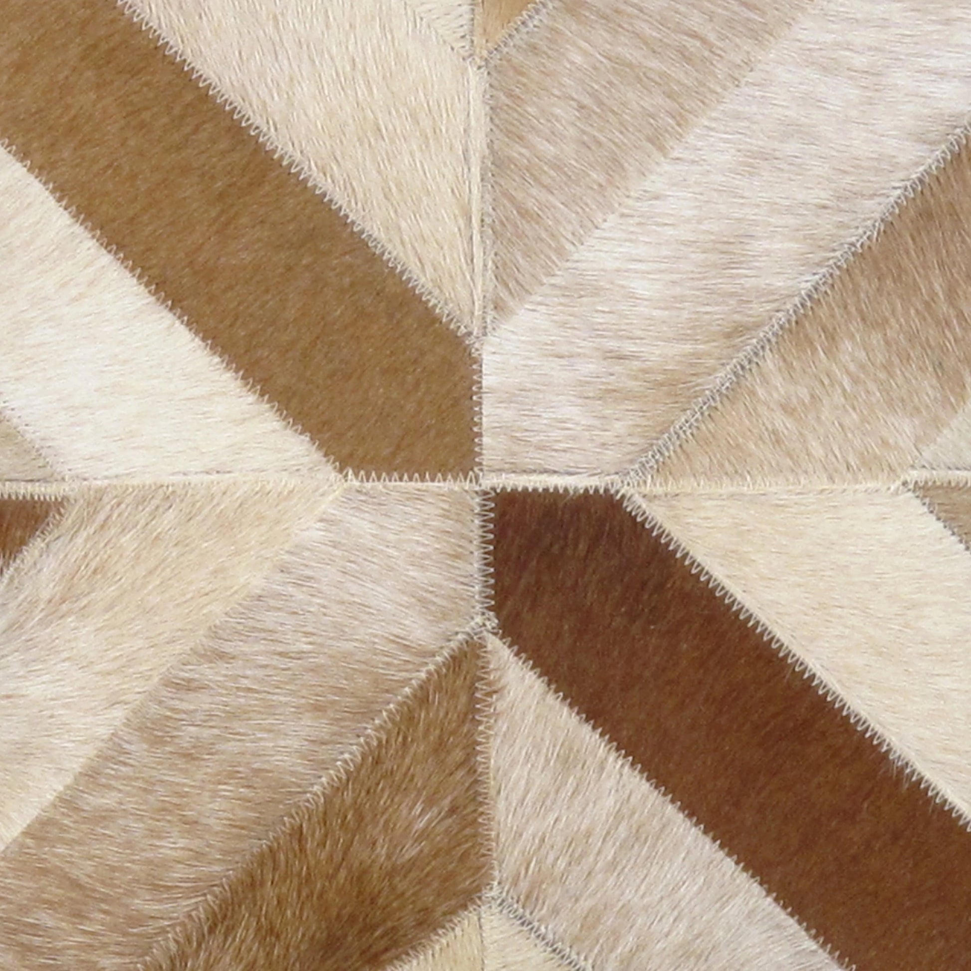 Safari Cowhide Throw Pillow by Pasargad Home in l. brown. Made from cowhide in a modern style.