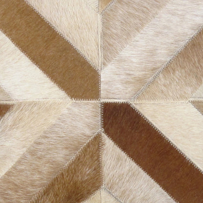 Safari Cowhide Throw Pillow by Pasargad Home in l. brown. Made from cowhide in a modern style.