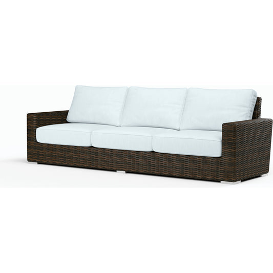 Montecito Outdoor Sofa by Sunset West in cognac. Made from resin wicker in a modern style.