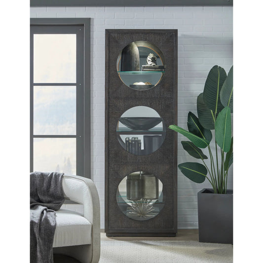 Contemporary Side Entry Curio Cabinet by Pulaski Furniture in dark wood. Made from quartered ash veneer in a unique style.