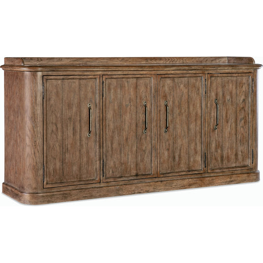 Americana Four-Door Buffet by Hooker Furniture in brown and honey finish. Made from oak veneers with solid-wood edge top in a rustic style.