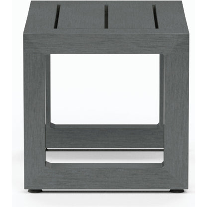 Redondo Outdoor End Table by Sunset West in slate. Made from aluminum in a modern style.