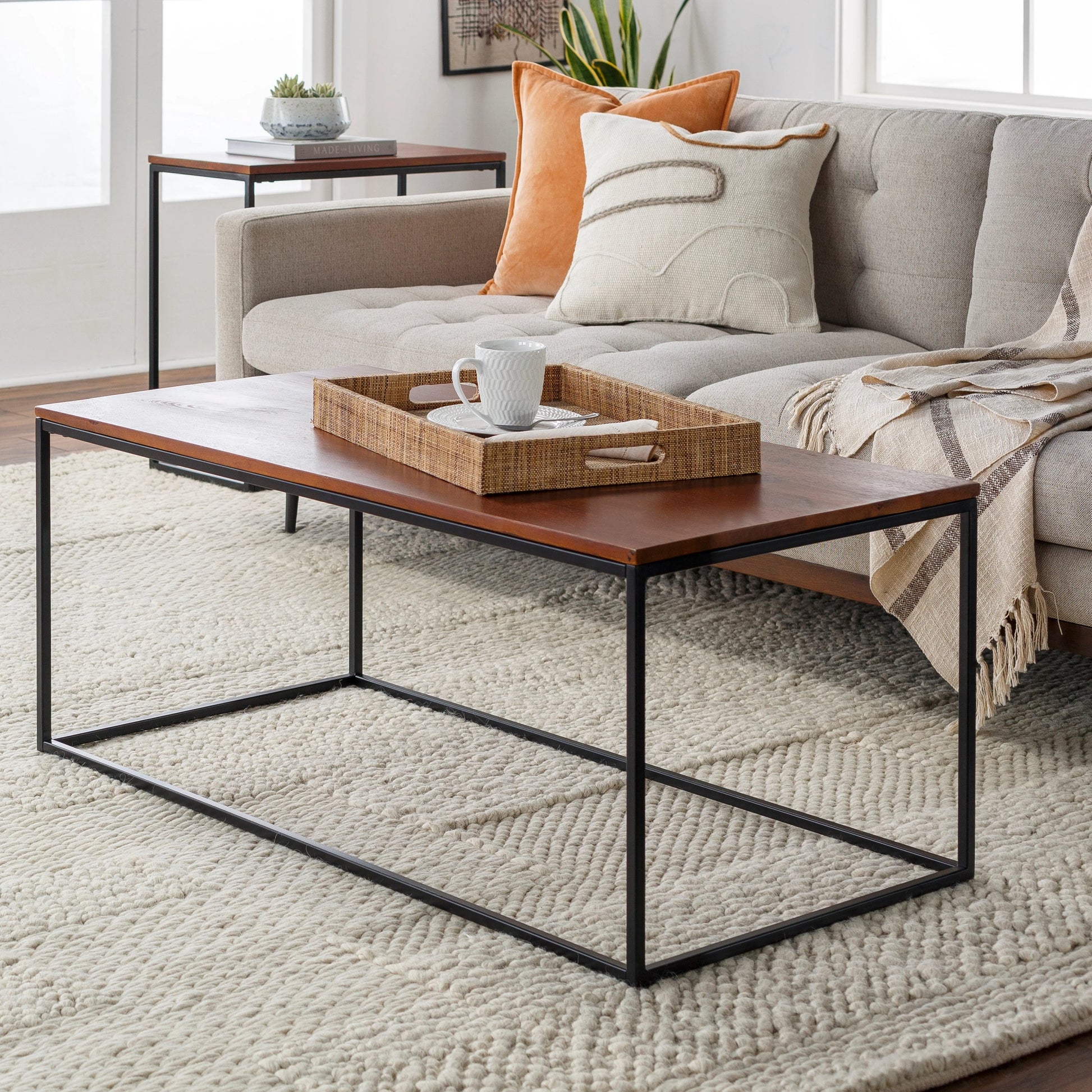 Aryaa Coffee Table by Livabliss in brown and powder coatedwood finish. Made from top: wood, base: 100% metal in a modern style.