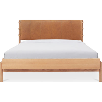 Colby Bed by Moe's Home Collection in camel and soap lacquer. Made from upholstery: 100% top, top grain leather, solid oak leg, headboard frame, oak veneer over mdf bed frame in a traditional style.