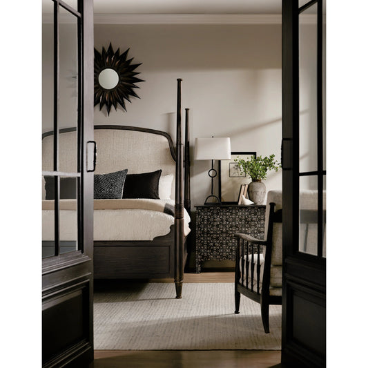 Americana Queen Upholstered Poster Bed by Hooker Furniture in beige and molasses. Made from oak veneers and fabric in a modern style.