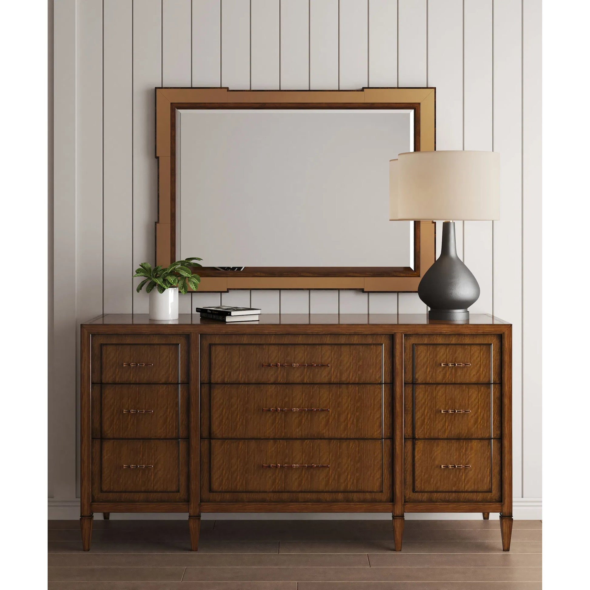 Eave 9 Drawer Dresser by A.R.T. Furniture in hazelnut. Made from poplar, parawood solids, walnut veneer in a traditional style.