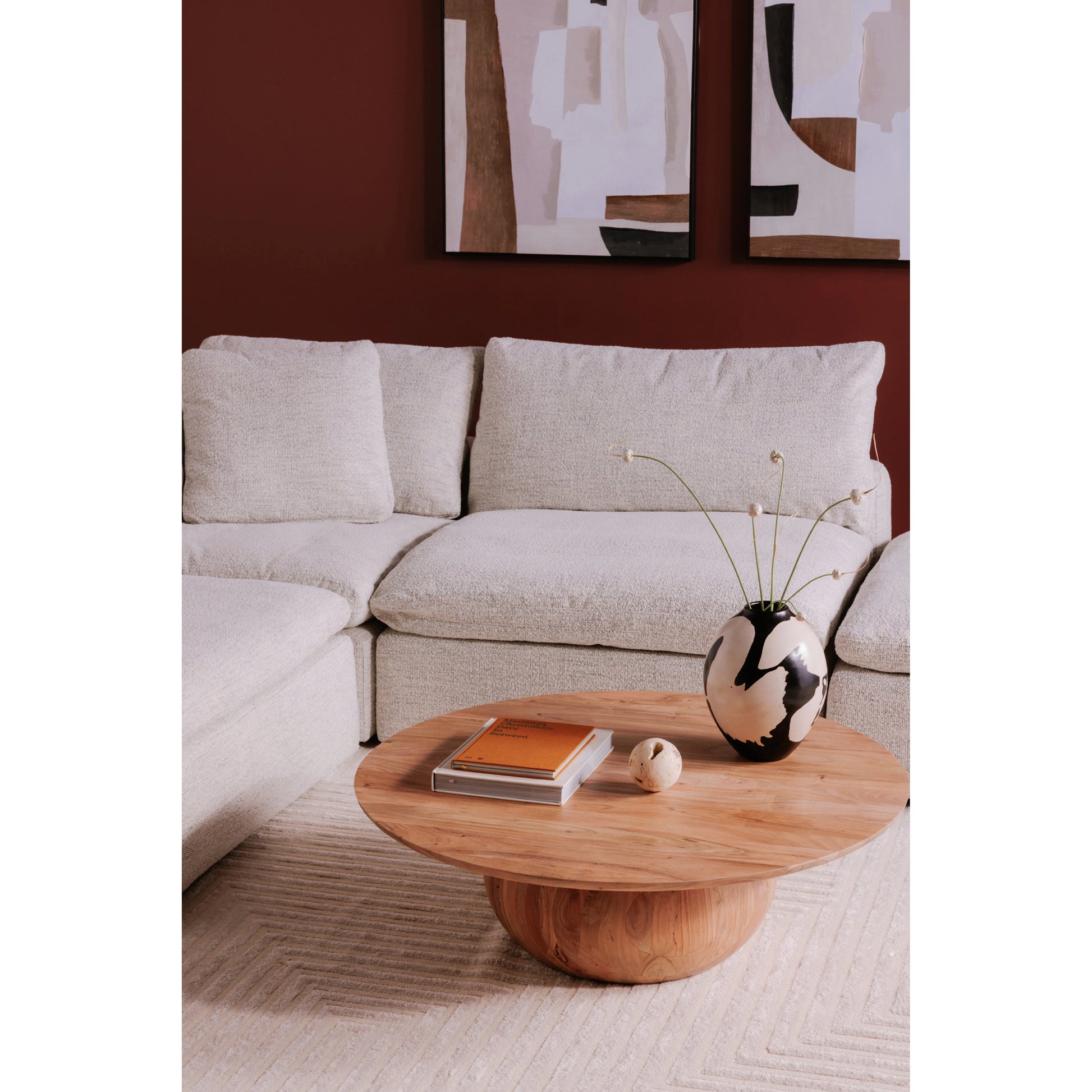 Clay Ottoman by Moe's Home Collection in coastside sand. Made from upholstery: neverfear™ fabric, 100% polyester, plywood frame, 50% feather, fibre blend channeled in a modern style.