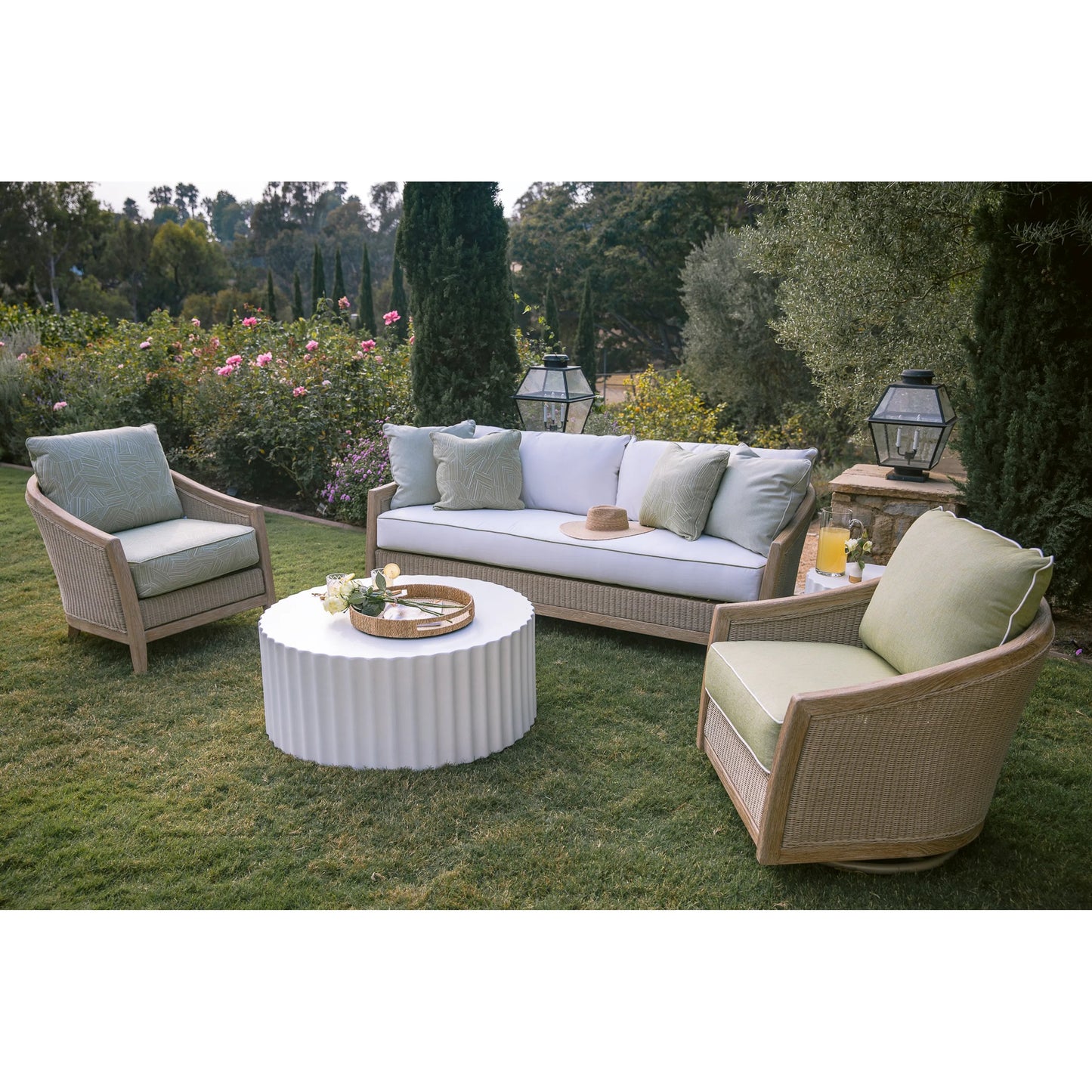 009 SI-2318670 | Lifestyle | Cambria Outdoor Sofa by Sunset West in light wood. Made from teak in a rustic style.