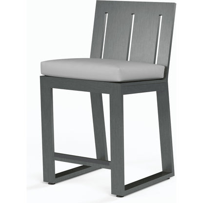 Redondo Outdoor Barstool by Sunset West in slate. Made from aluminum in a modern style.
