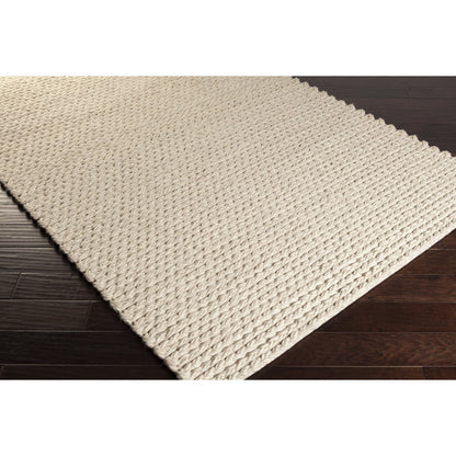 Yukon Rug - 12752 by Surya in light beige. Made from 1000% wool - felted in a unique style.
