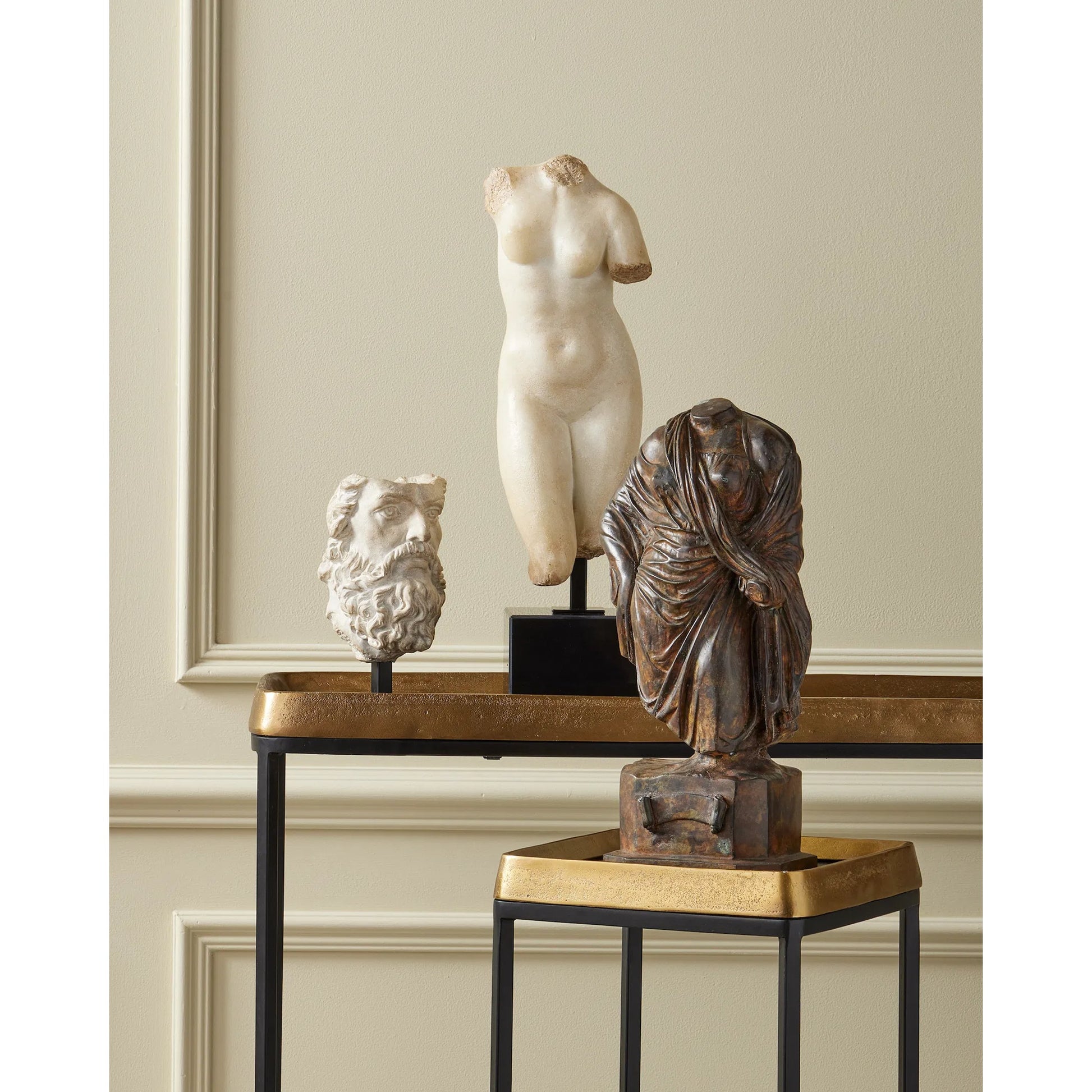 Tanay Side Table by Currey and Company in antique brass, graphite, black. Made from cast aluminum, iron in a transitional style.