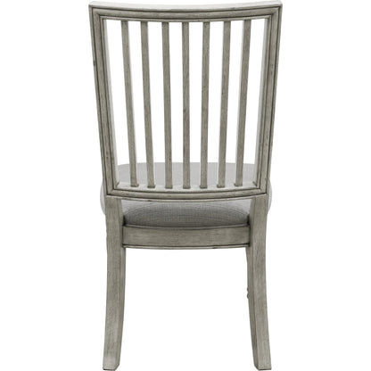 Madison Ridge Side Chair (Set of 2) by Pulaski Furniture in bluff grey. Made from asian hardwood, oak veneers, fabric in a traditional style.