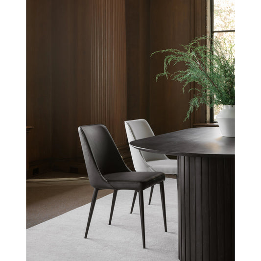Lula Dining Chair (Set of 2) by Moe's Home Collection in black. Made from upholstery: polyurethane, iron frame, plywood frame, foam seat in a transitional style.