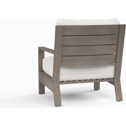 Laguna Outdoor Club Chair by Sunset West in browns. Made from aluminum in a modern style.