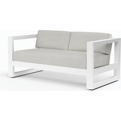 Newport Outdoor Loveseat by Sunset West in frost. Made from aluminum in a modern style.