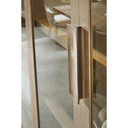 Westwood Display Cabinet by Hooker Furniture in light wood and polished limestone. Made from oak veneers, glass in a transitional style.