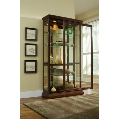 43'' Wide Two Way Sliding Door Curio Display Cabinet in Warm Brown by Pulaski Furniture in warm mid-tone. Made from hardwood solids in a traditional style.