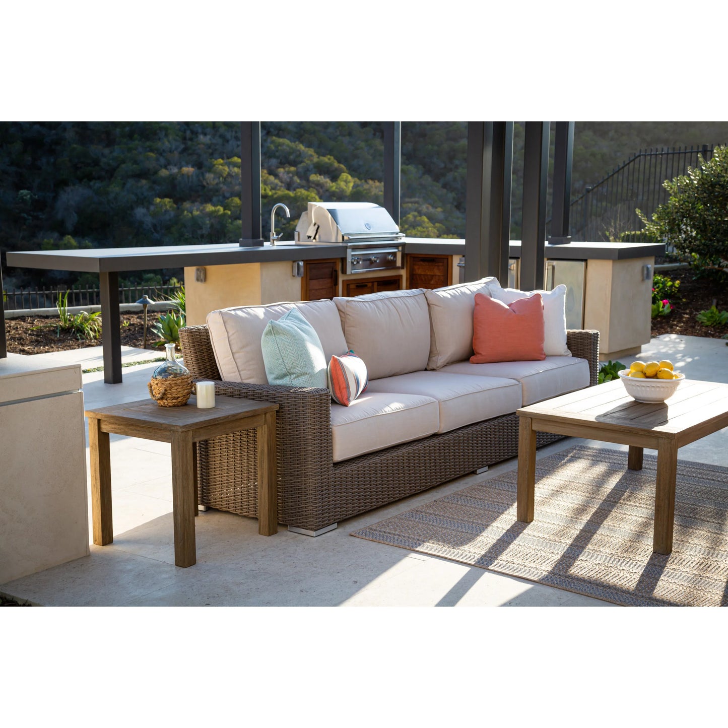 006 SI-2166792 | Lifestyle | Coronado Outdoor Sofa in Canvas Flax by Sunset West in driftwood. Made from resin wicker in a modern style.