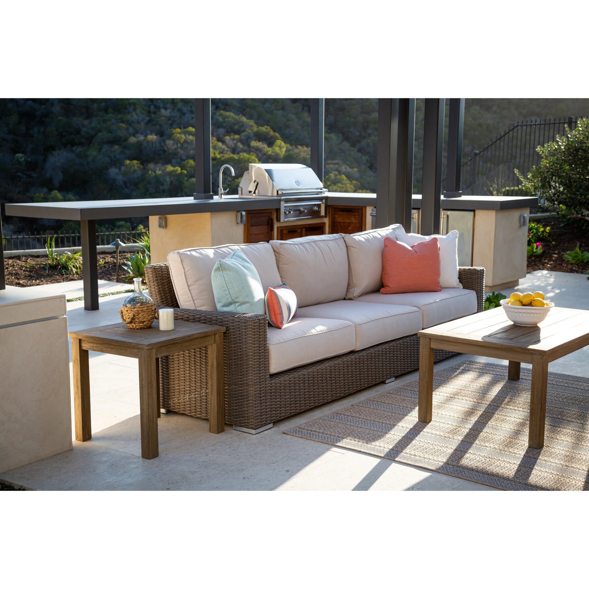 Coronado Outdoor Sofa in Canvas Flax by Sunset West in driftwood. Made from resin wicker in a modern style.