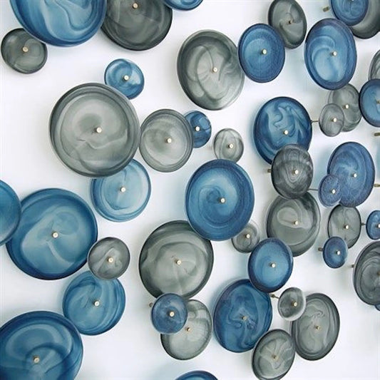 Crosshatched Wall Discs by Global Views. Made from glass in a modern style.