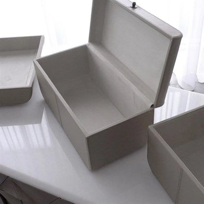 Curved Corner Box by Global Views. Made from mdf, leather, polysuede lining in a eclectic & global style.