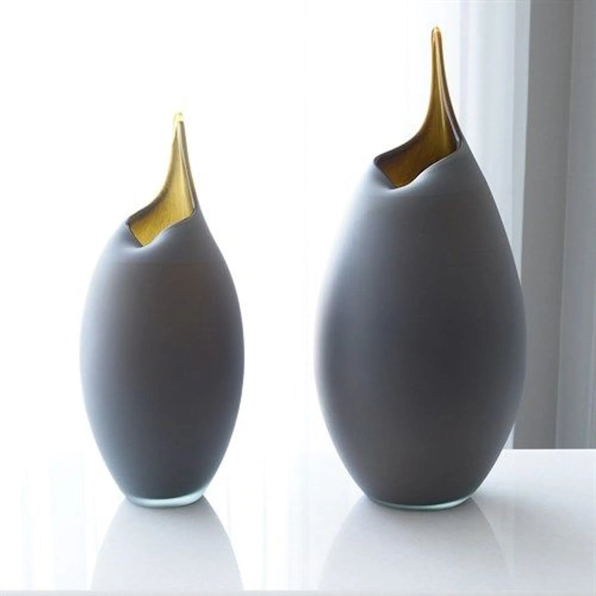 Frosted Vase by Global Views. Made from glass in a modern style.