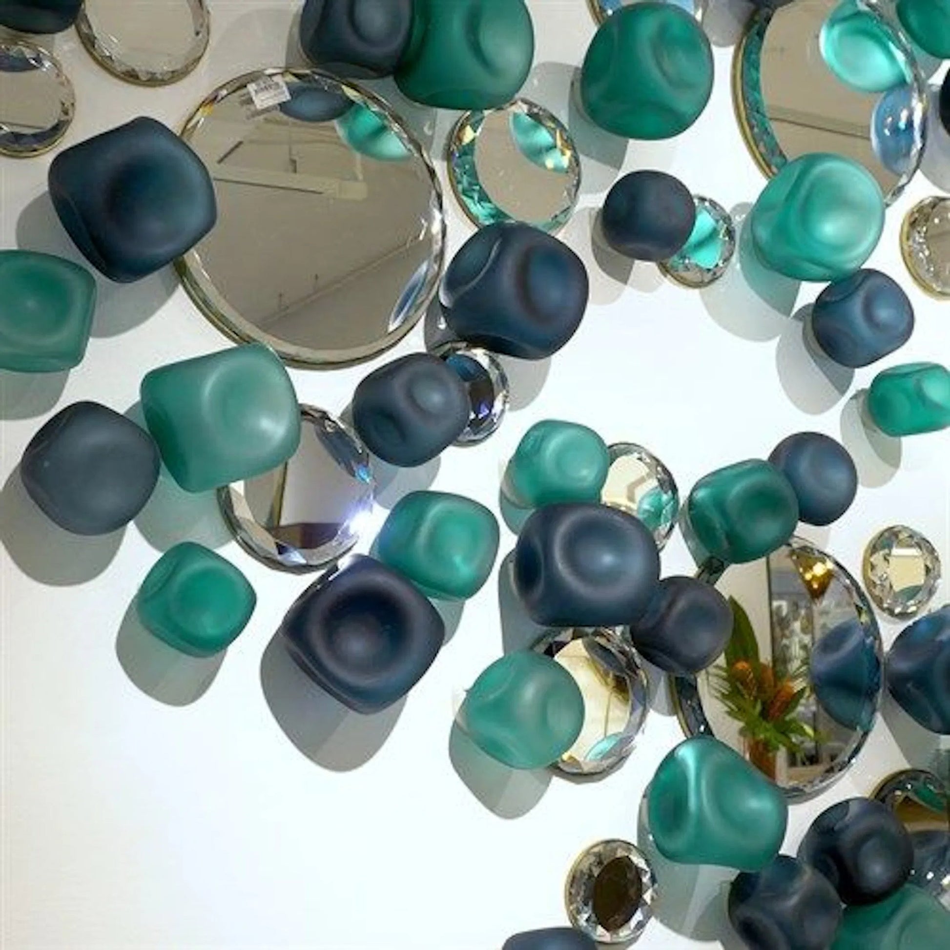 Wall Rocks by Global Views. Made from glass in a coastal style.