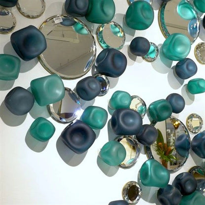 Wall Rocks by Global Views. Made from glass in a coastal style.