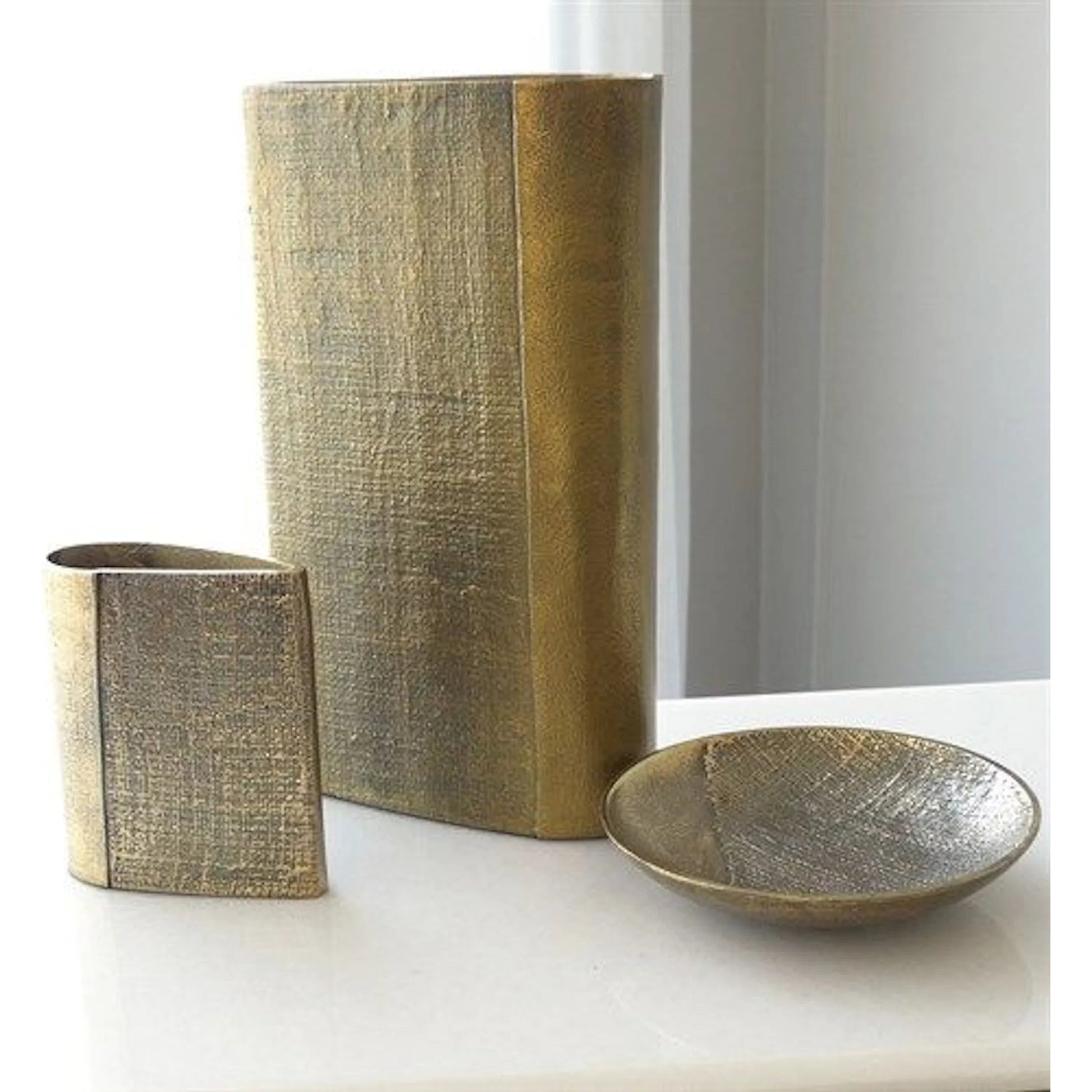 Linen Large Round Tray by Global Views in sand and brass. Made from unique in a modern style.