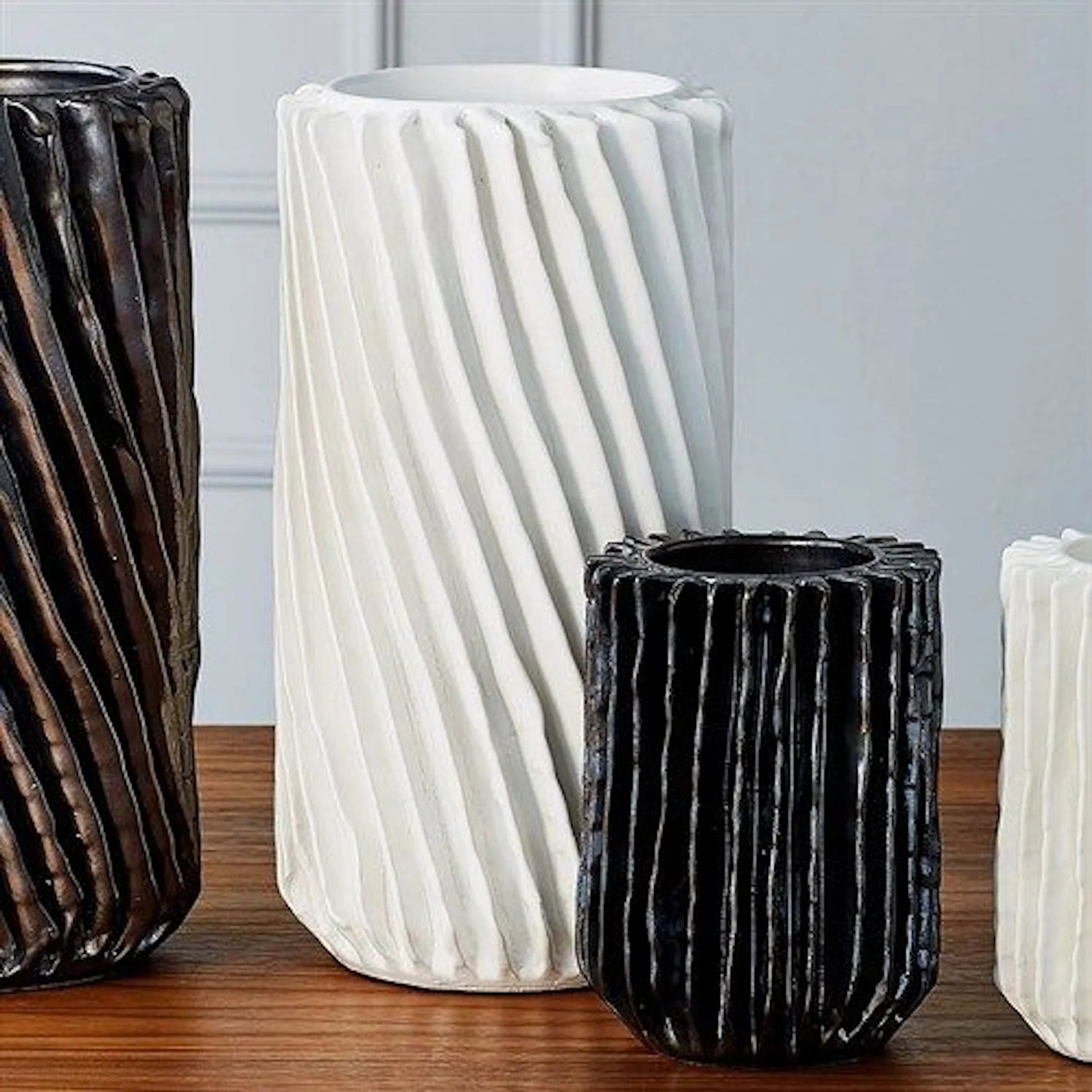 Radiator Swirl Vase by Global Views in matte white. Made from ceramic in a eclectic & global style.