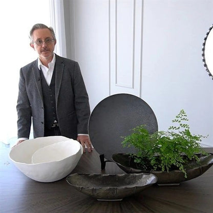 Spiral Bowl by Global Views in matte white. Made from ceramic in a coastal style.