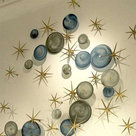 Crosshatched Wall Discs by Global Views. Made from glass in a modern style.
