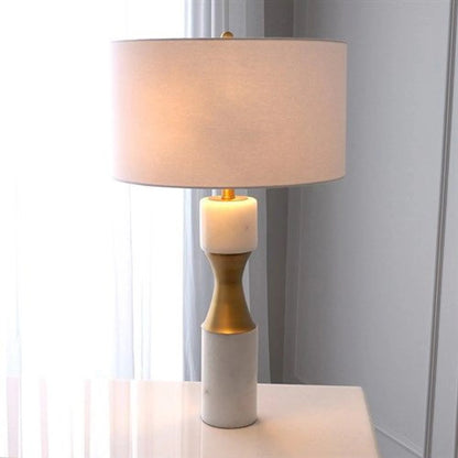 Marble Cinch Lamp by Global Views. Made from marble, brass in a transitional style.
