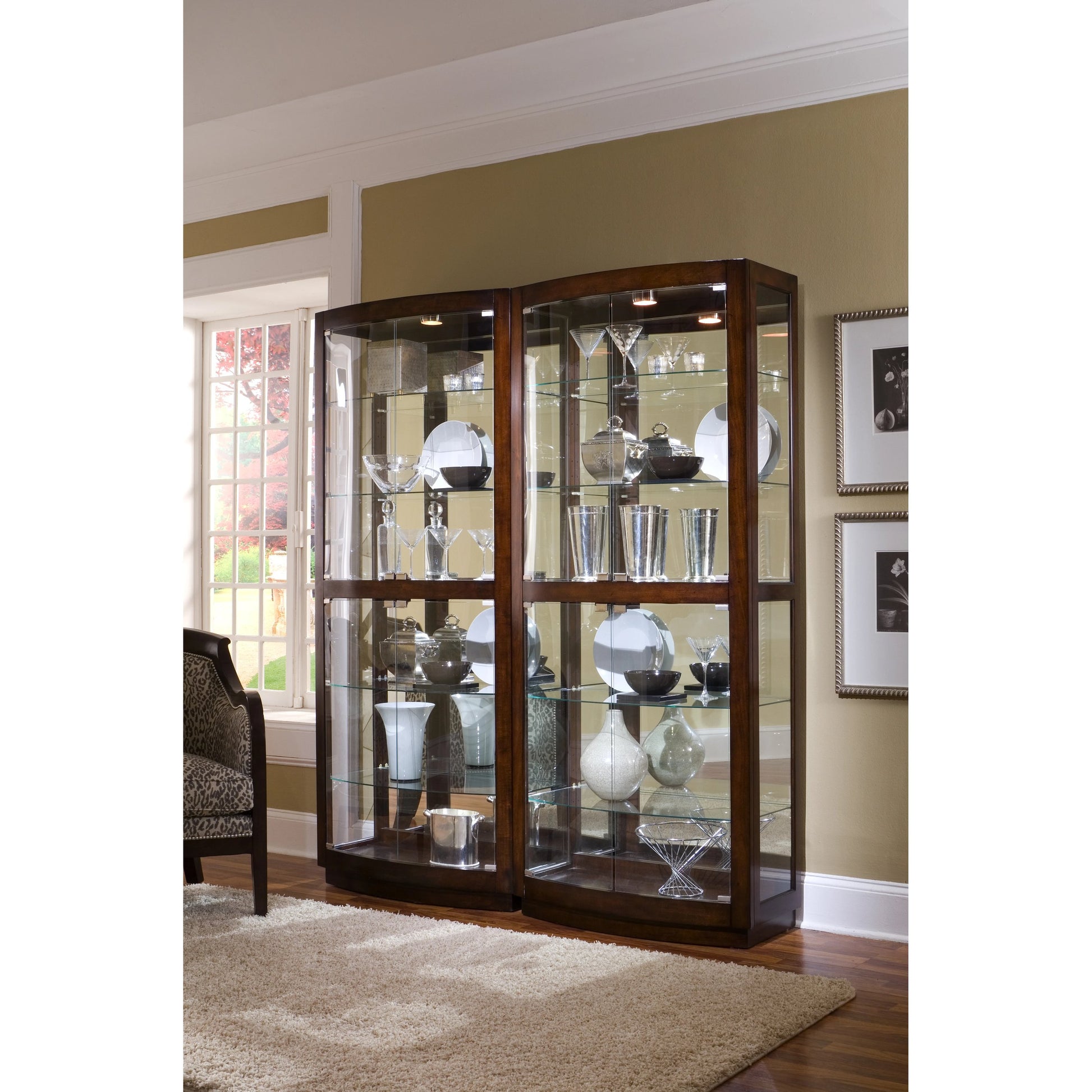 33'' Wide Hardwood Mahogany Curio Display Cabinet by Pulaski Furniture in dark mahogany brown. Made from select hardwoods in a traditional style.