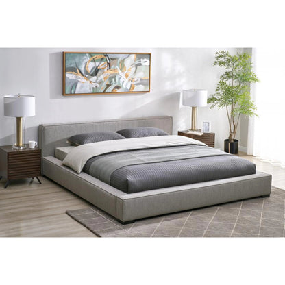 Zest Wide Upholstered Bed by Zest. Made from rubberwood, fabric in a modern style.