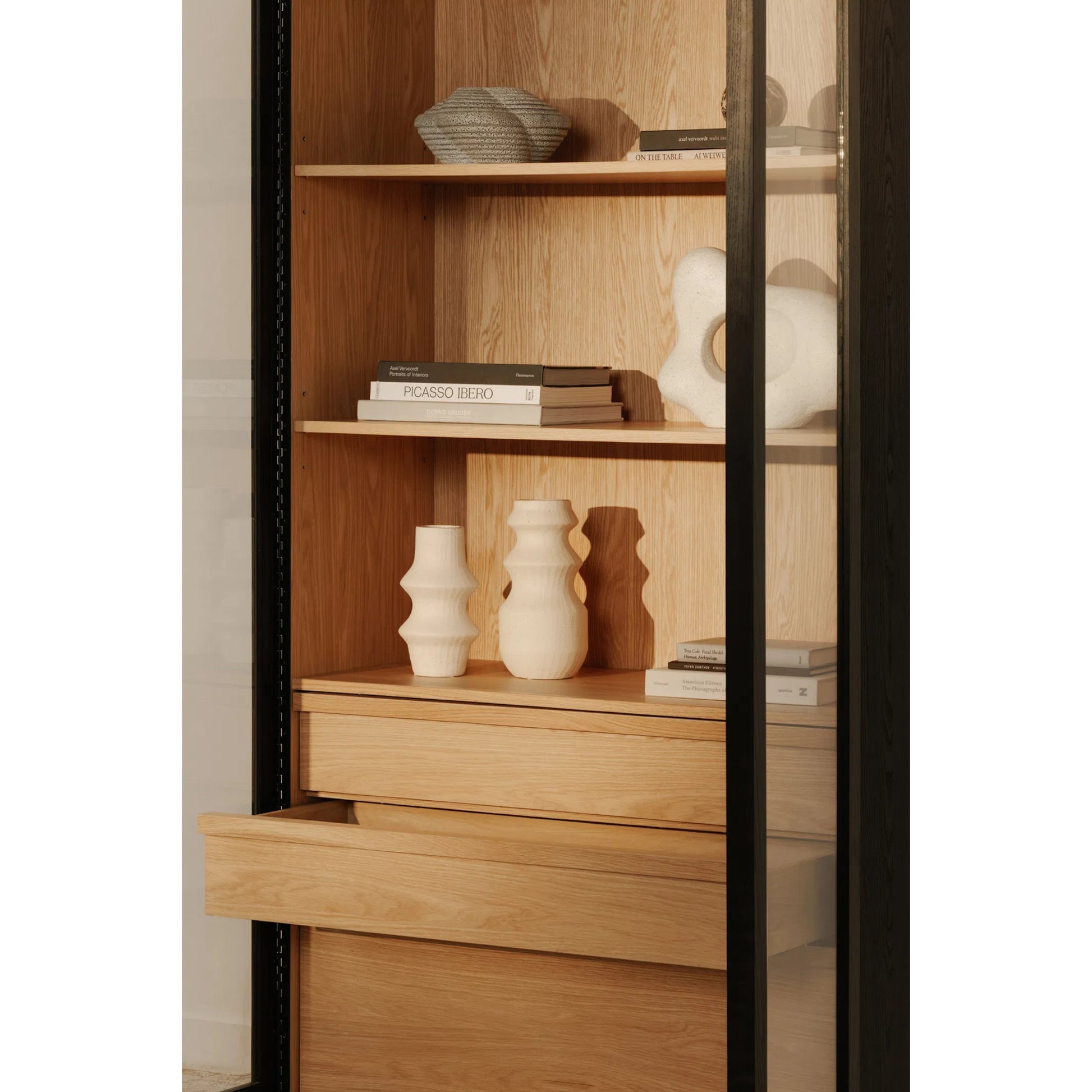 Charlotte Cabinet by Moe's Home Collection in black ash, natural ash, oak. Made from solid ash door frame, drawer handle, ash veneer over mdf body, oak veneer shelf, inner drawer, rubber wood base, 5mm tempered glass in a moder