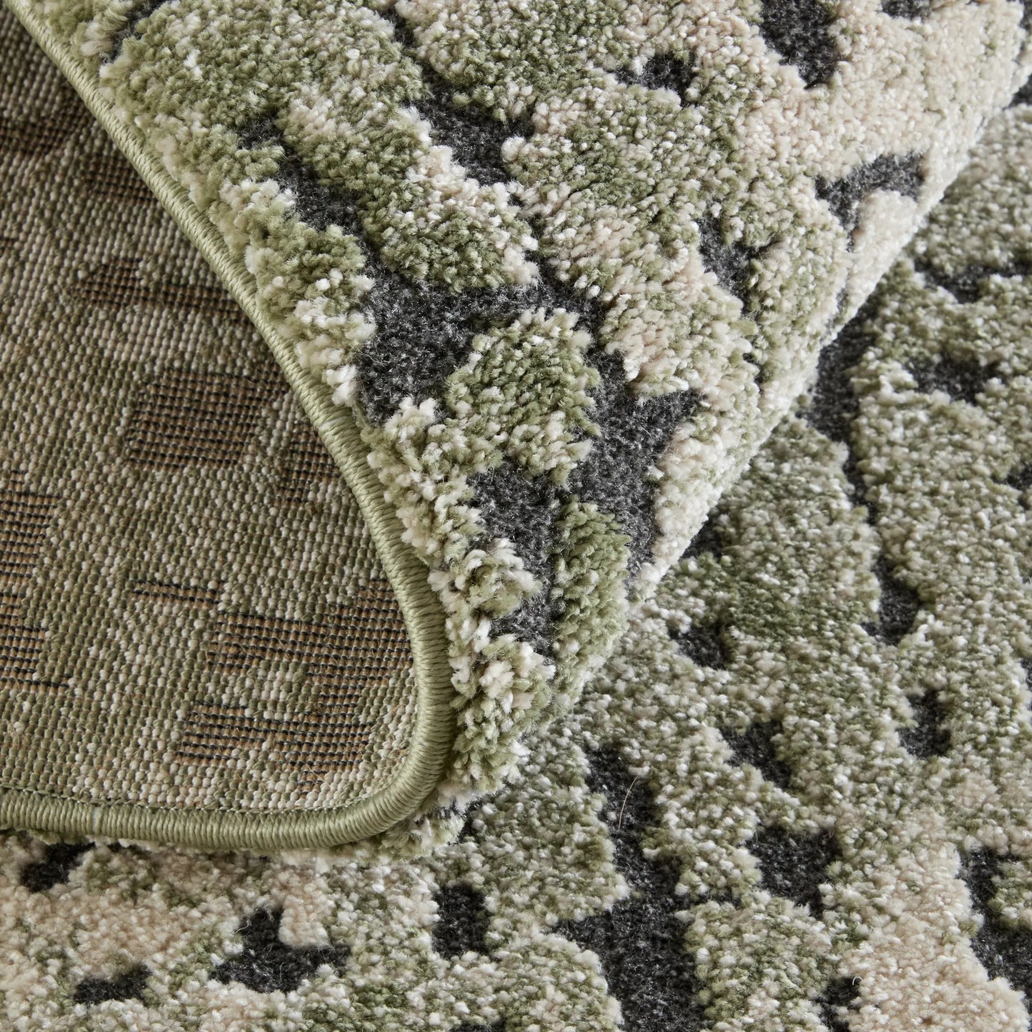 005 SI-2635517,SI-2635518,SI-2635519,SI-2635520,SI-2635521 | Closeup | Gilmore GIL39UNF Rug by Feizy in green, ivory, black. Made from polypropylene in a unique style.